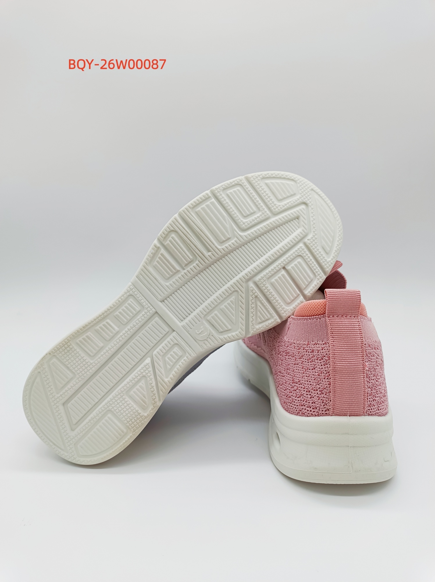 Pink knit casual footwear sample and outsole